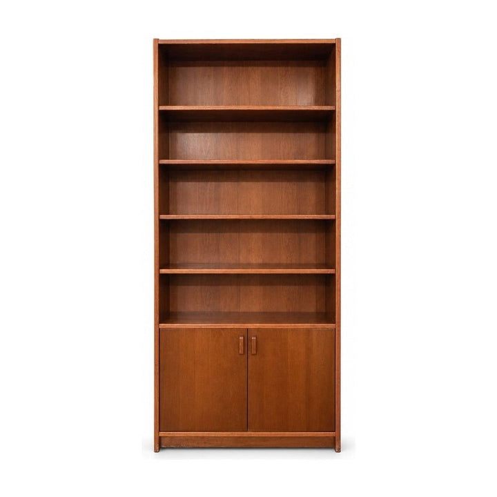 Medium Walnut tall Danish bookcase with a narrow depth and full-height shelves.