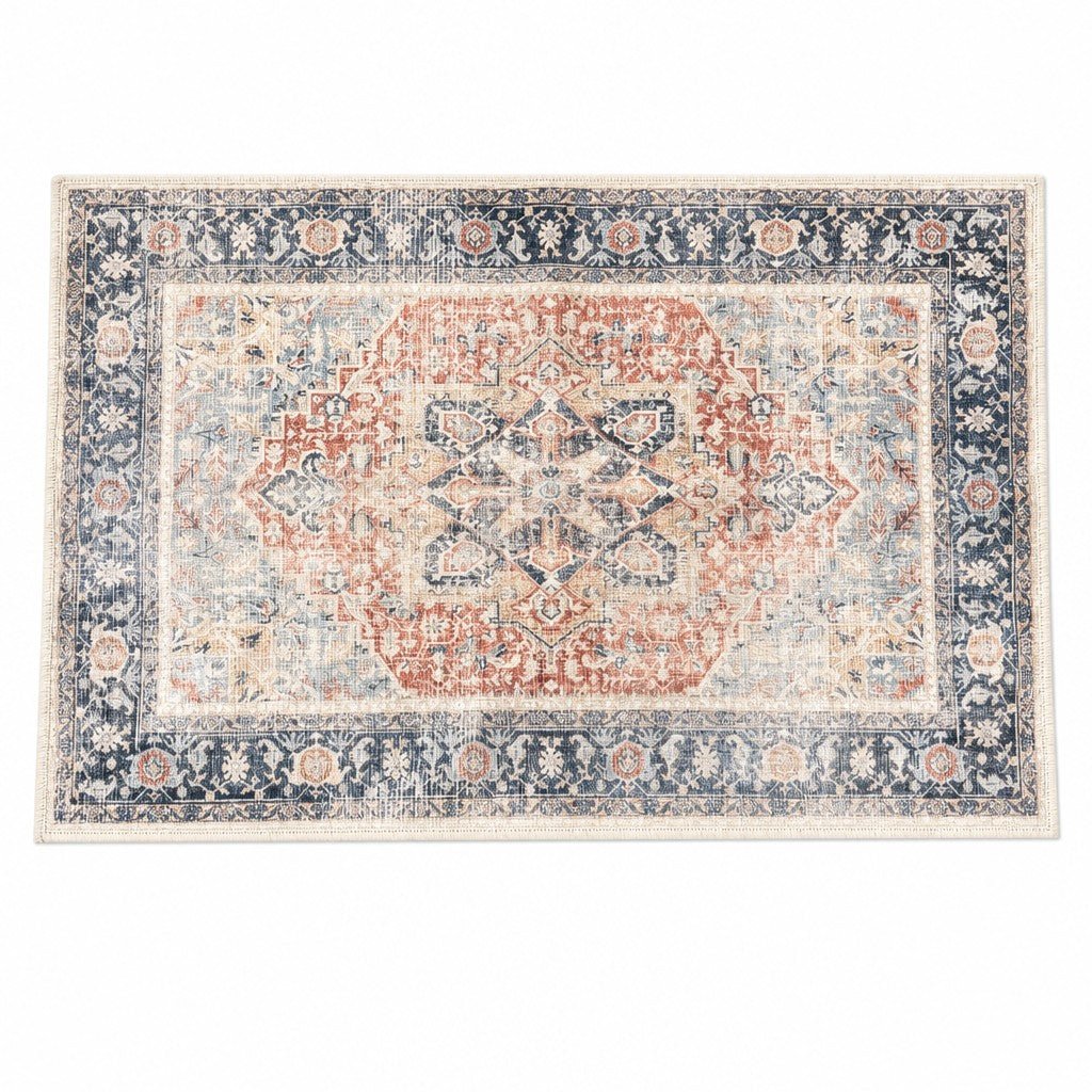 Terracotta and navy accent rug with a geometric woven pattern
