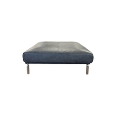 Slate gray square leather ottoman with a low profile, made in Italy
