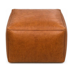 Cognac leather square pouf ottoman with taut cube silhouette and low 15-inch height