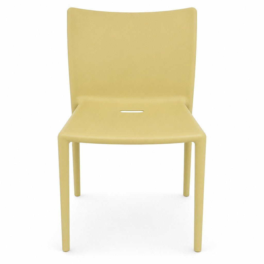 Lime green molded Air Chair with continuous single-piece design by Jasper Morrison