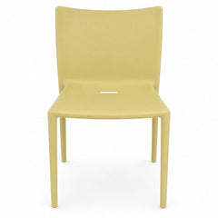 Lime green molded Air Chair with continuous single-piece design by Jasper Morrison