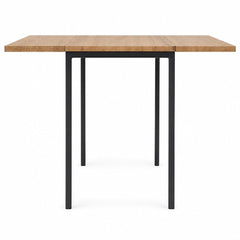 Natural wood and black mid-century dining table with drop leaves