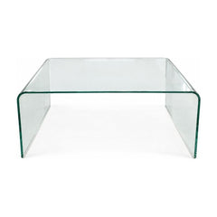 Clear glass coffee table with a low, nearly square top.