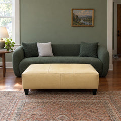 Baby Yellow leather ottoman with a long, low rectangular bench profile. - detail view 1