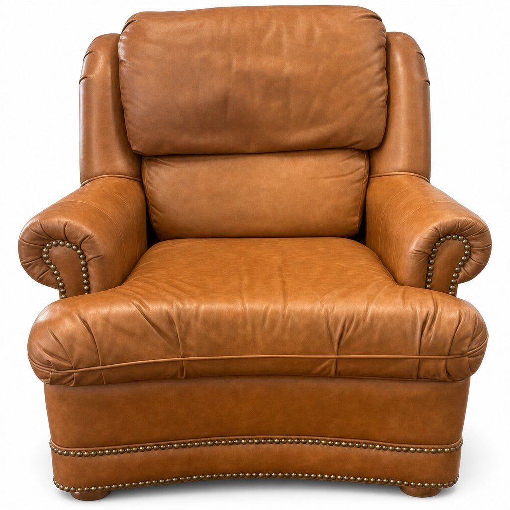 Cognac brown leather mid-century lounge armchair with a solid wood frame and low-slung lines