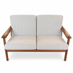 Light green mid-century loveseat with solid wood frame and Japanese joinery