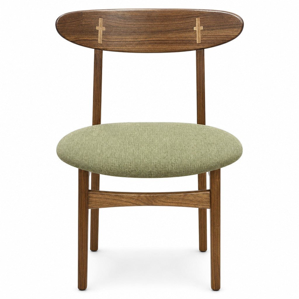 Walnut brown mid-century dining chair with a green upholstered seat and splayed legs