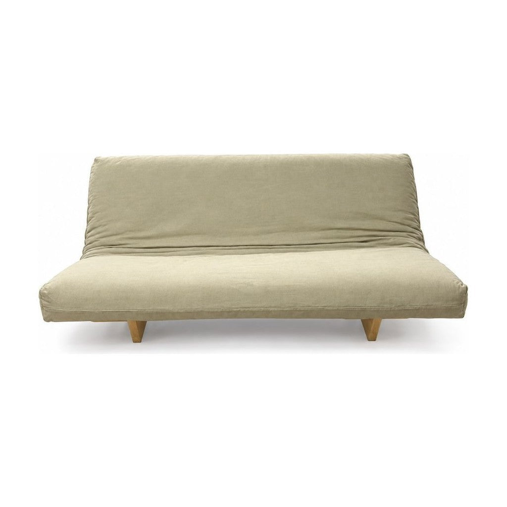 Beige futon sofa with a machine-washable cover and low rectangular silhouette.