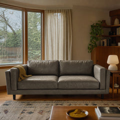 Gray leather sofa with low-slung lines and a hardwood frame by Room and Board - view 2