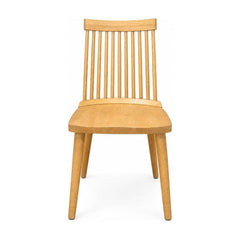 Blonde dining room chairs with tapered wood frames, shown as a set of four.