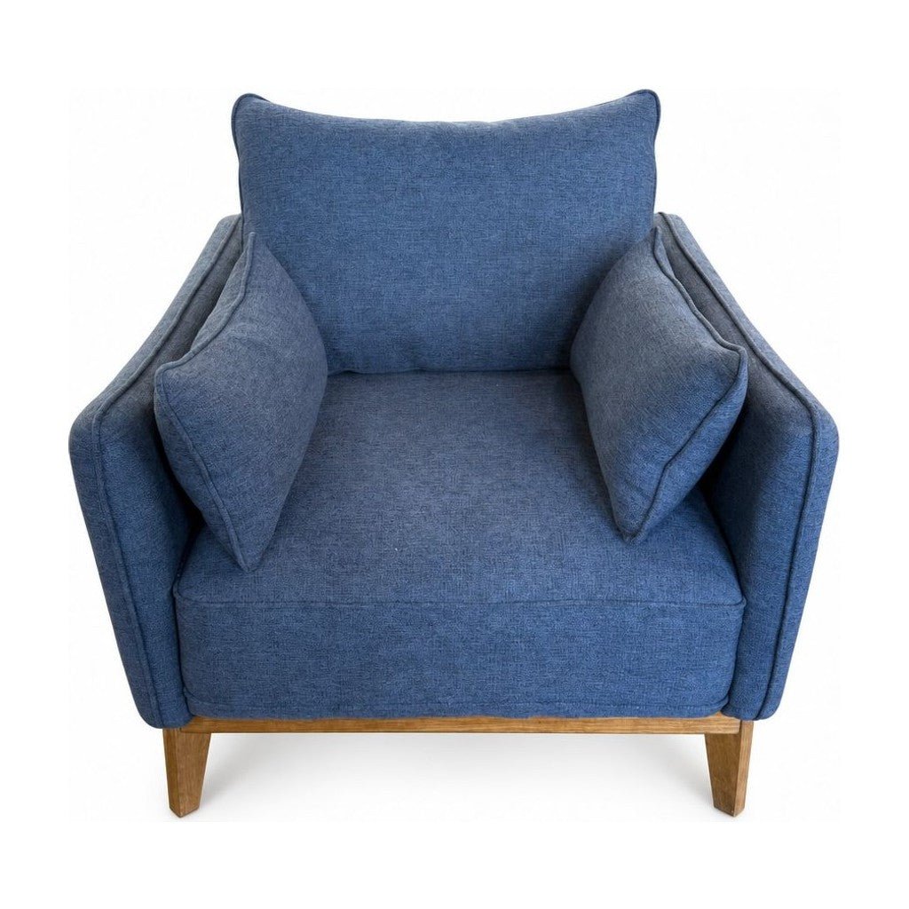 Medium Blue mid-century armchair with a boxy upholstered seat and wood frame.