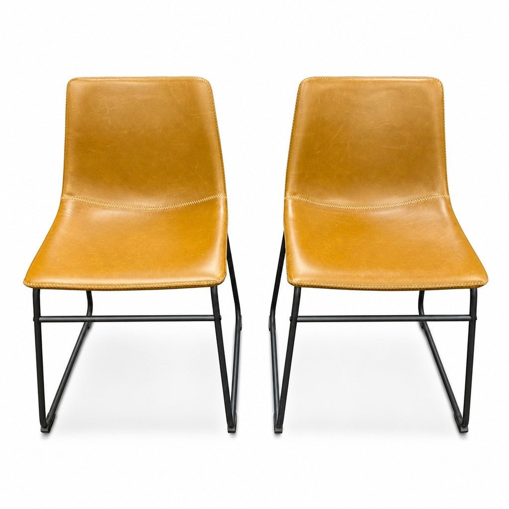 Tan mid-century dining chair with a sculpted solid-wood frame and tapered legs