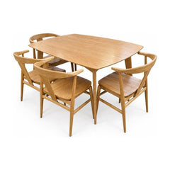 Natural Oak dining table and four chairs with a rectangular wood top.