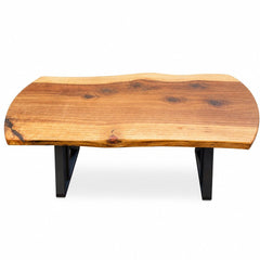 Redwood mid-century coffee table with clean low-slung lines and visible wood grain