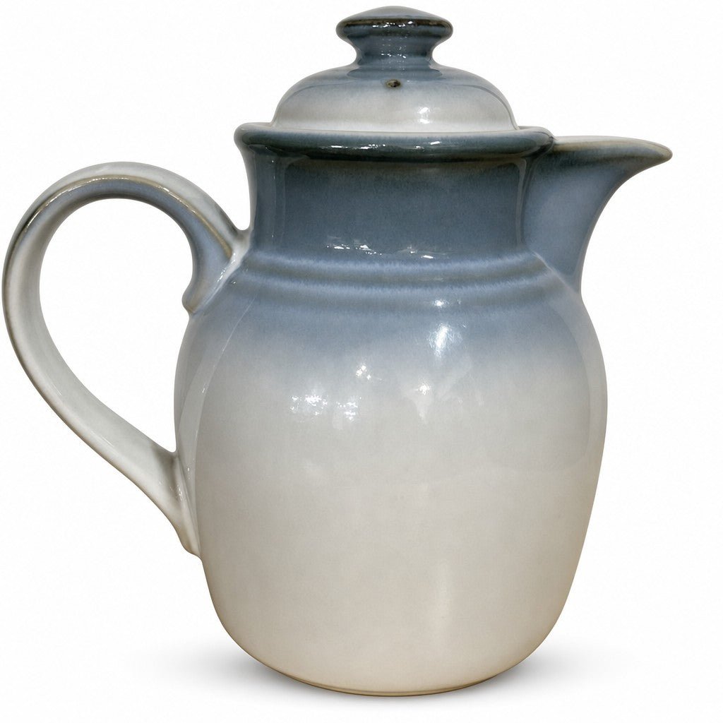 Blue and cream stoneware coffee server with a hand-thrown glazed finish by Mortals