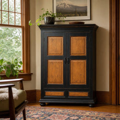 Black and Honey Oak traditional two-door armoire with honey-oak inset door panels. - detail view 1