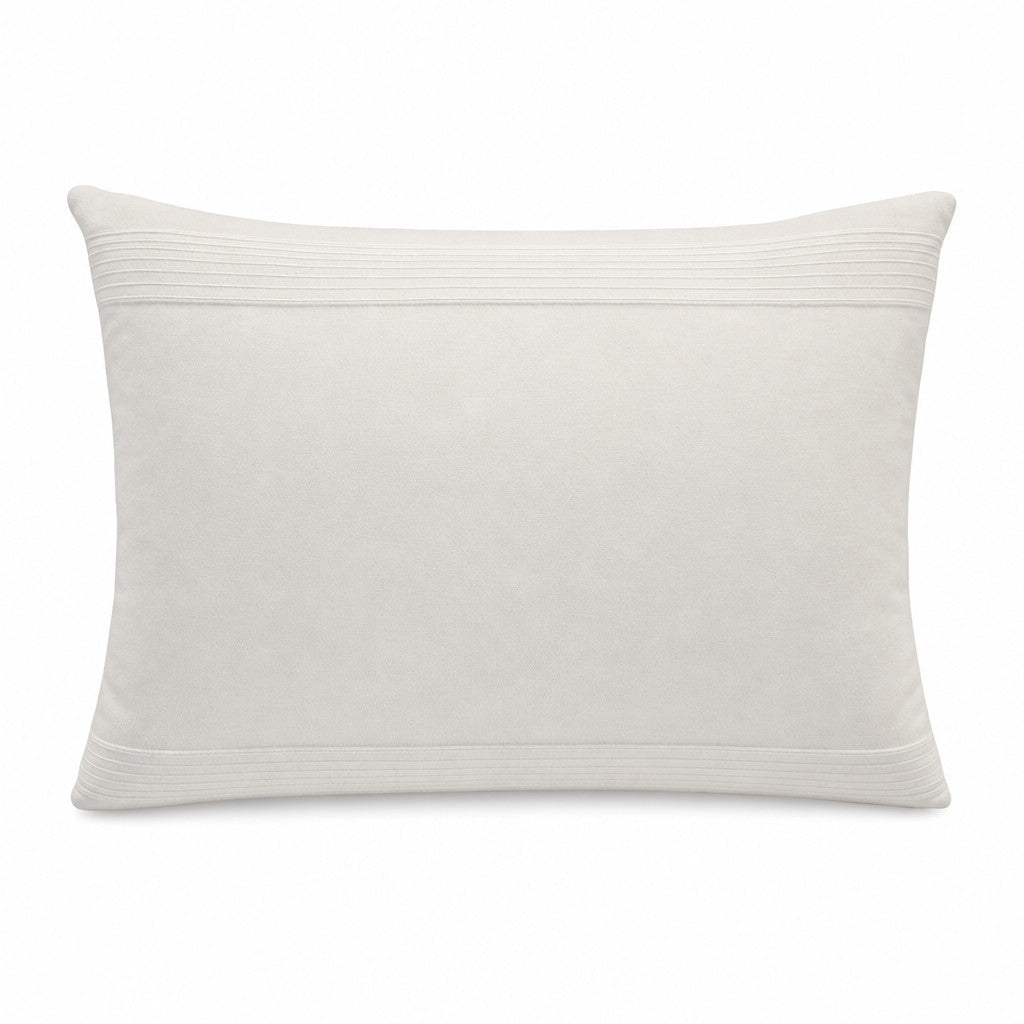 Cream accent pillows with a plush rectangular shape, sold as a pair
