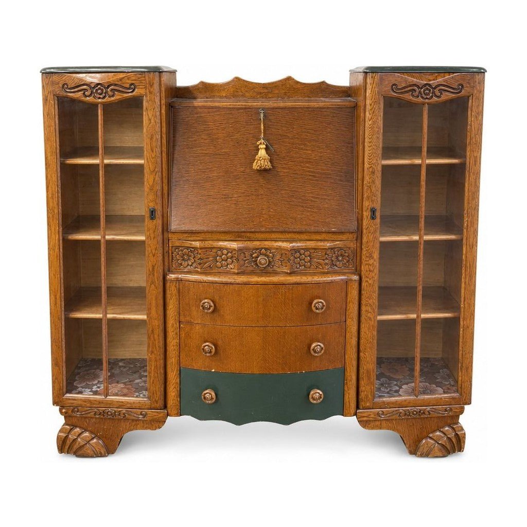 Natural wood secretary desk with tall slim proportions and drop-front silhouette.