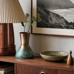 Copper Patina Footed Vase, 8.5" Tall styled with a pleated lamp and a stoneware bowl on a Portland console - Whats New Furniture