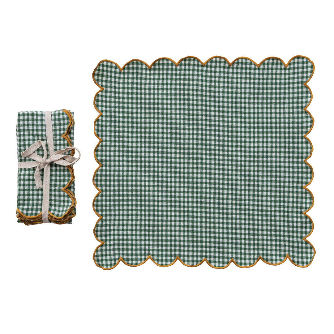 Green check cotton scalloped napkin with mustard contrast stitching, shown open beside a tied set