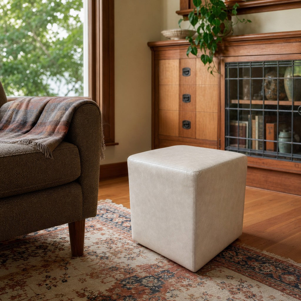 Cream square ottoman with cube silhouette and linen-like upholstery. - detail view 1