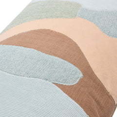 Close-up of curved patchwork seams and woven texture in sage blue and brown on the 36-inch lumbar pillow - Whats New Furniture Portland OR