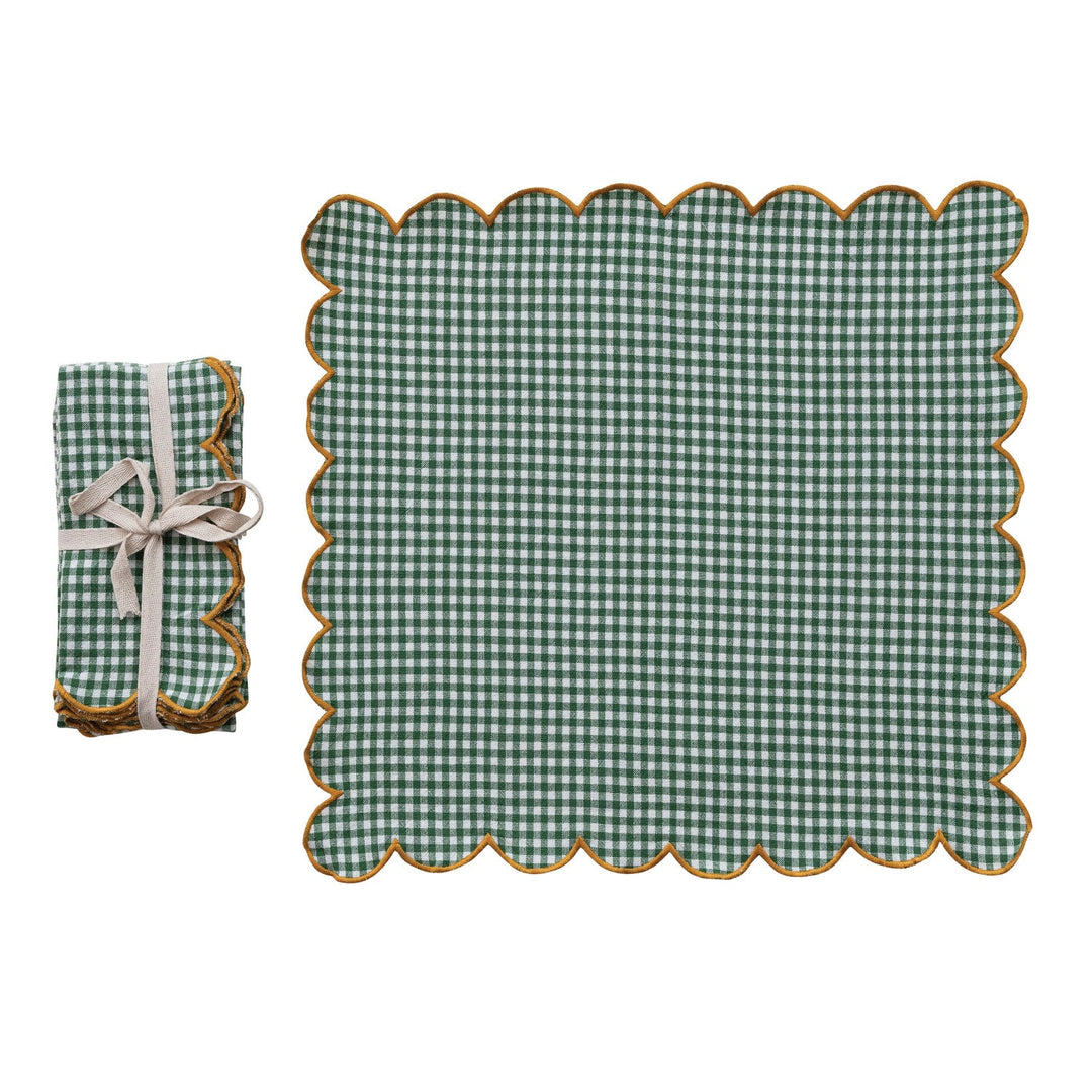 Green check cotton scalloped napkin with mustard contrast stitching, shown open beside a tied set