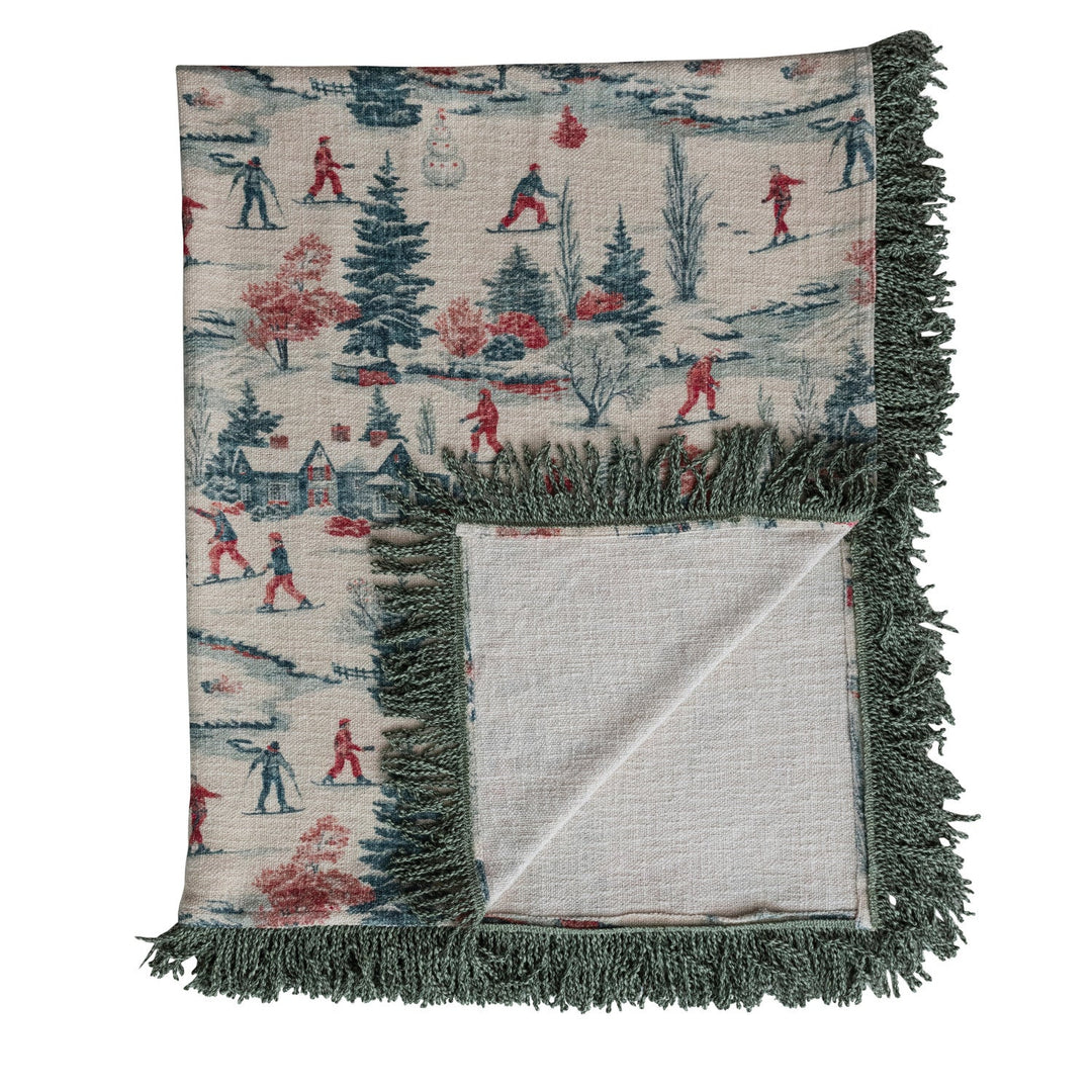 Cotton Slub Printed Throw with Ski Scene &amp; Bullion Fringe, 60" x 50" folded corner showing the reverse - soft goods by Creative Co-Op - Whats New Furniture Portland OR