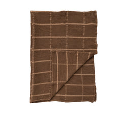 Corner fold detail of the Cotton Waffle Weave Throw showing both faces of the brown grid weave - Whats New Furniture Portland