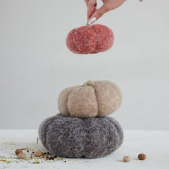 Felt pumpkin trio styled stacked with the brown 7-inch pumpkin in the middle of grey and orange - Whats New Furniture Portland