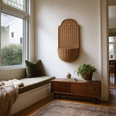 Hand-Woven Rattan Wall Basket, Natural, 34" Tall styled in a Portland living room - Whats New Furniture