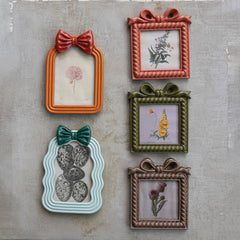 Resin Photo Frame with Bow, 2 Styles (Holds 4" x 6" Photo) grouped on a wall - decor by Creative Co-Op - Whats New Furniture Portland OR