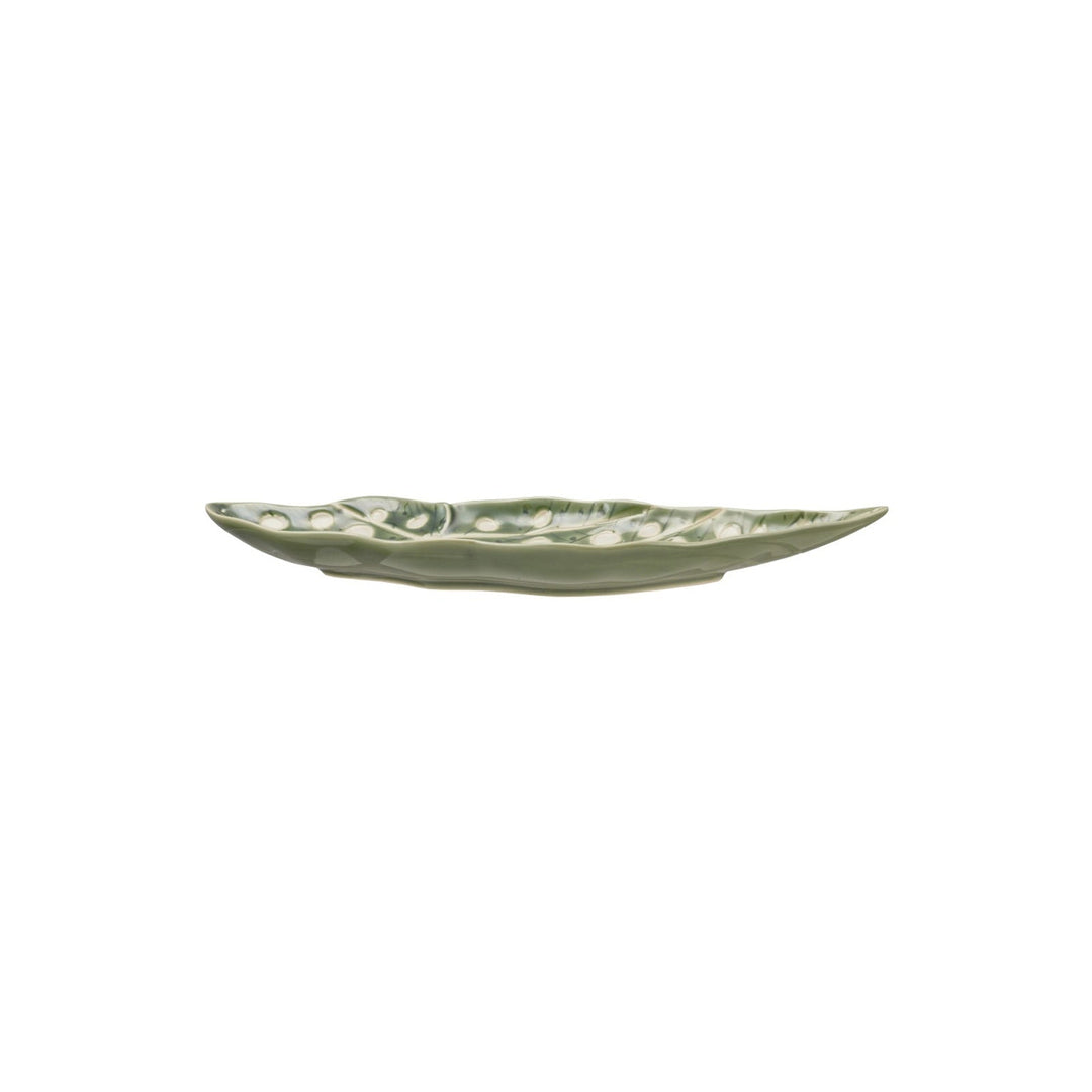 Stoneware Leaf Shaped Plate in green, side profile showing the shallow well and flat foot - serveware by Creative Co-Op - Whats New Furniture Portland OR