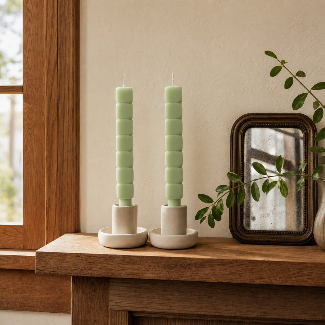 Mint stacked block taper candles styled on a Portland mantel - Whats New Furniture