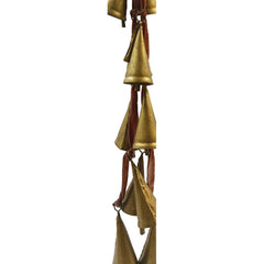 Close-up of the antiqued gold cone bells strung down the velvet ribbon - Creative Co-Op holiday decor - Whats New Furniture Portland