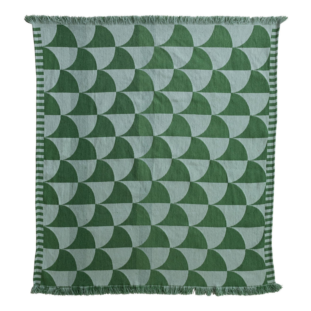 Woven Indoor Outdoor Throw with green scalloped fan pattern and fringe laid flat - outdoor throw by Creative Co-Op - Whats New Furniture Portland OR