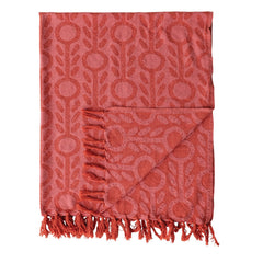 Folded corner of the recycled cotton jacquard throw showing the woven floral pattern and knotted fringe - Whats New Furniture Portland