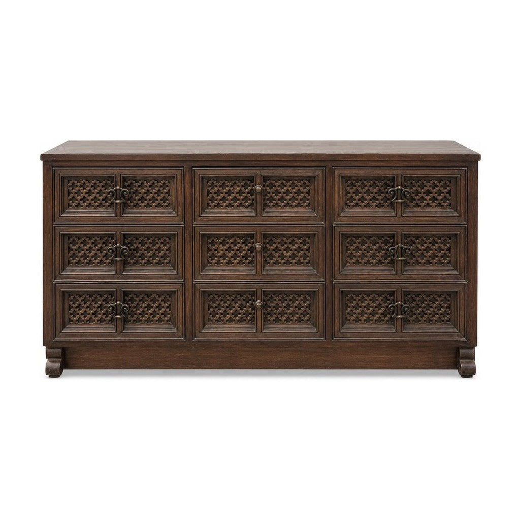 Dark brown mid-century wood dresser with a long low case and visible marks along the side.