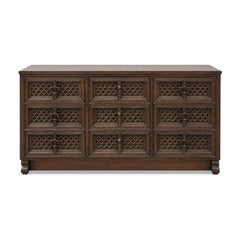 Dark brown mid-century wood dresser with a long low case and visible marks along the side.