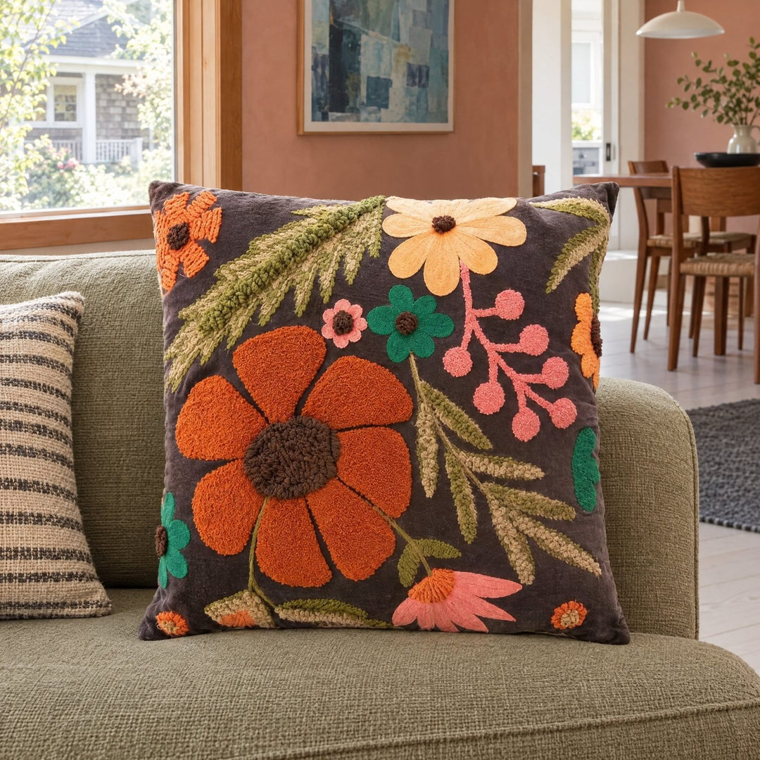 Multicolor embroidered velvet floral pillow styled on a sofa - Whats New Furniture Portland OR