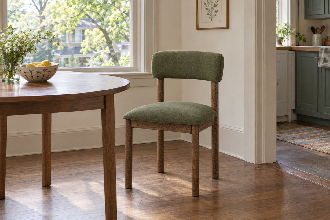Faulkner Dining Chair in Moss Green styled beside a dining table - Whats New Furniture Portland OR