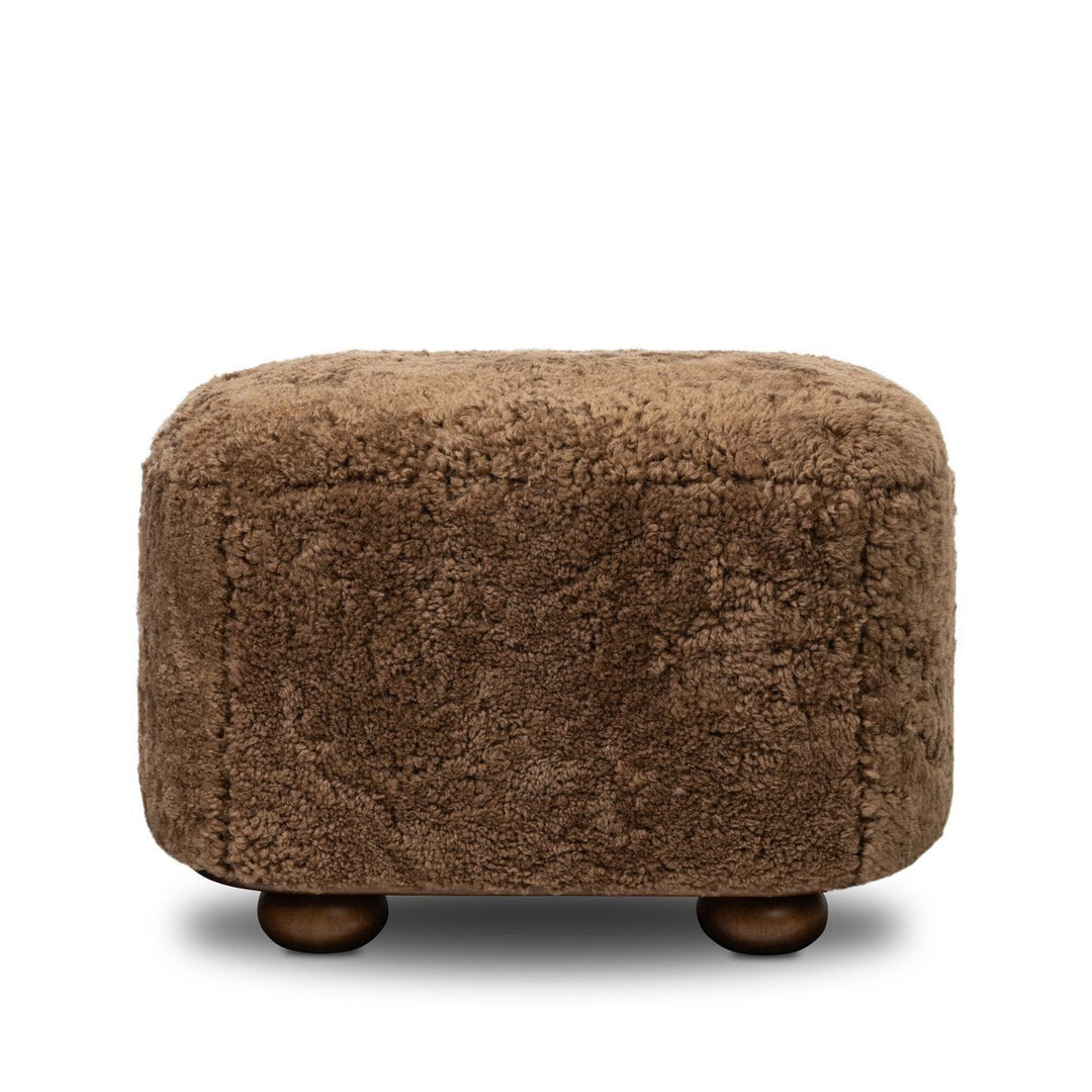 Bilbury Oval Ottoman in Amber Shearling front studio view - Whats New Furniture Portland OR