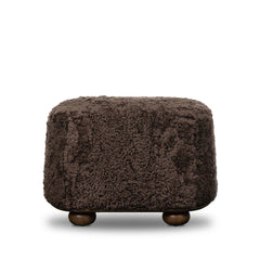 Bilbury Oval Ottoman in Cocoa Shearling front studio view - Whats New Furniture Portland OR