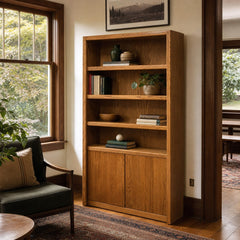 Golden Oak mid-century bookcase with tall open shelves and vertical wood grain. - detail view 1