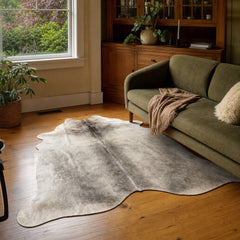 Gray Beige cow hide area rug with irregular natural hide markings. - detail view 1