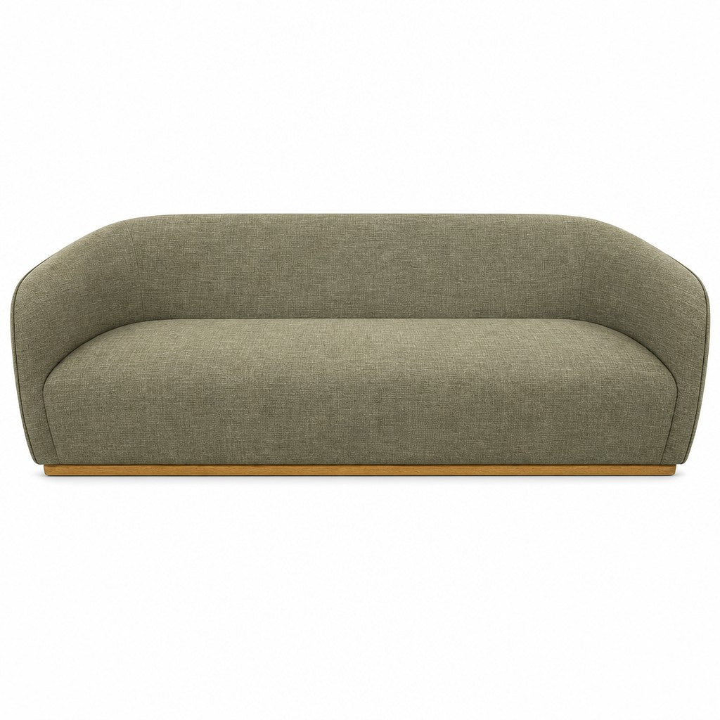 Green mid-century sofa with warm oak trim and clean horizontal lines