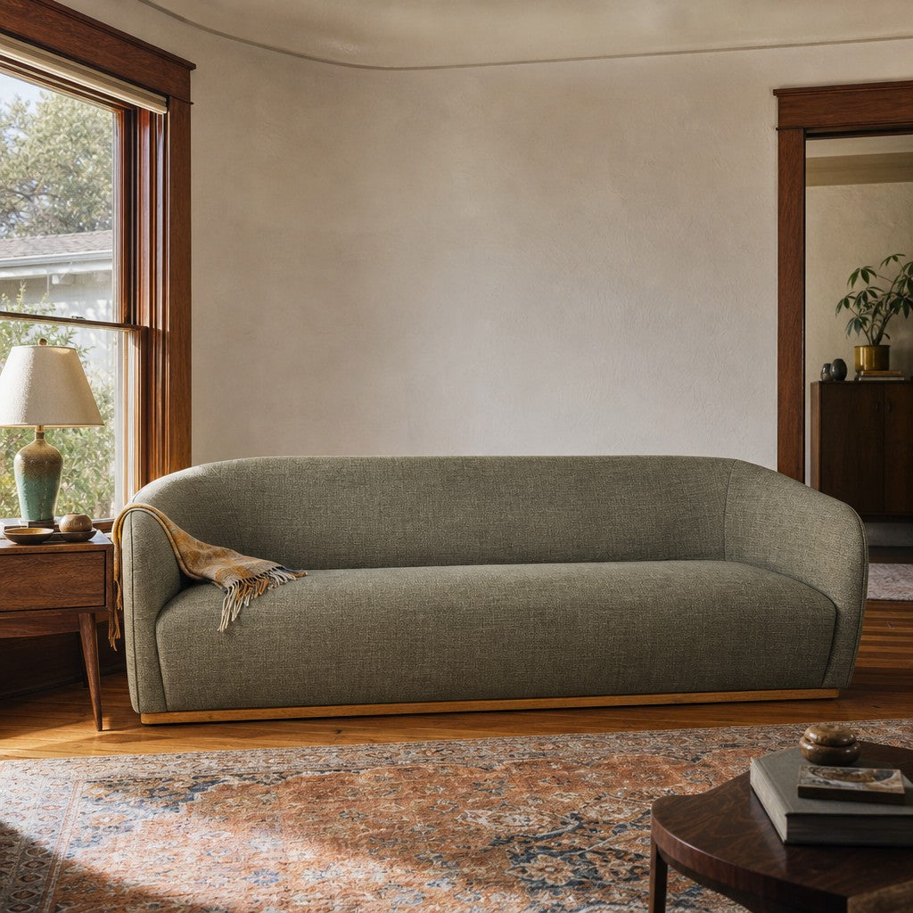 Green mid-century sofa with warm oak trim and clean horizontal lines - view 2