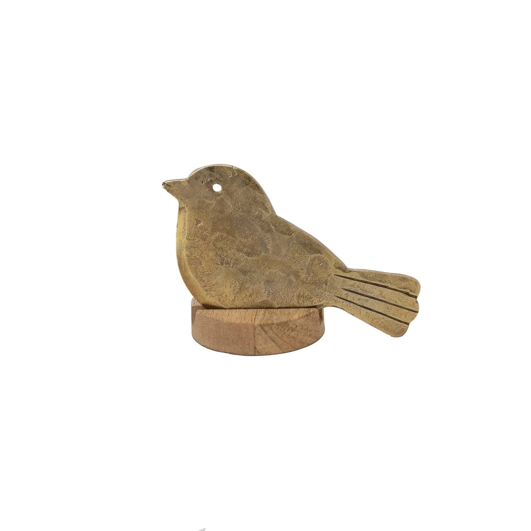 Hand-Forged Bird Cheese Knife with Mango Wood Stand - brass bird cheese knife resting on its wood stand - Creative Co-Op - What&