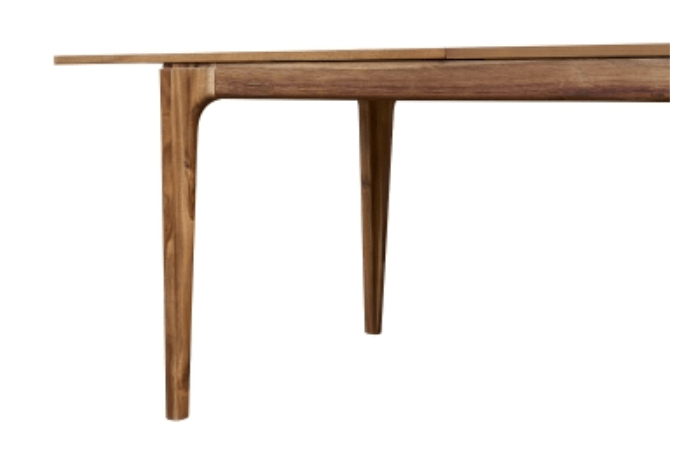 Hereford Butterfly Dining Table in Hazelnut Brown side profile view showing tapered leg silhouette - acacia dining table by NPD - Whats New Furniture Portland OR